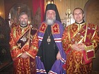 Bishop Longin with his Serbian protodeacons Milovan and Pavle